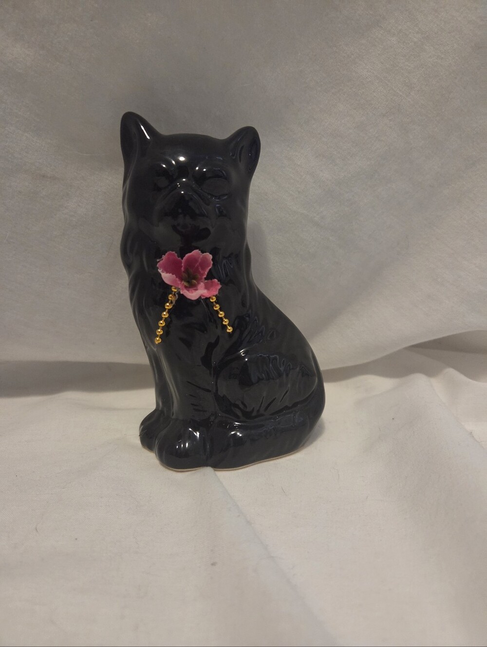 Decorative Black Ceramic Cat Figurine with Pink Flower